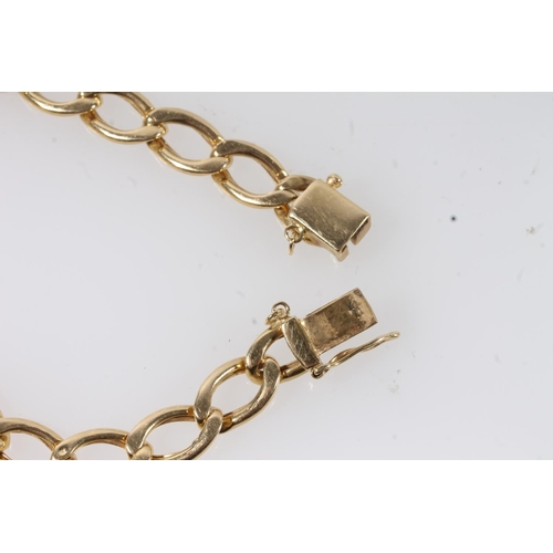 103 - 18ct gold curb link bracelet, the clasp stamped '750 A1', 17.6g.