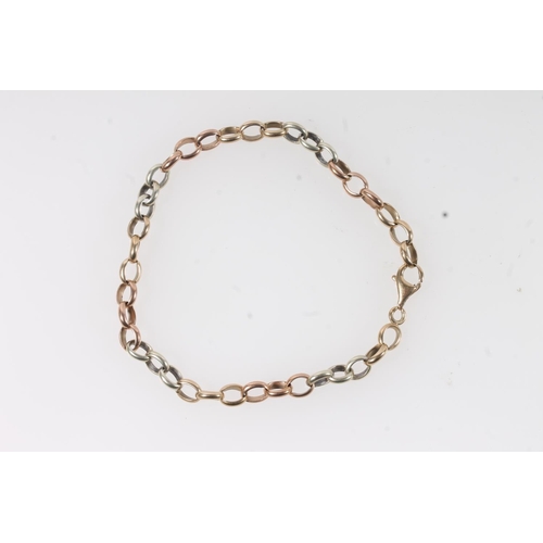 104 - 9ct yellow, white and rose gold cable link bracelet, 15.8g.