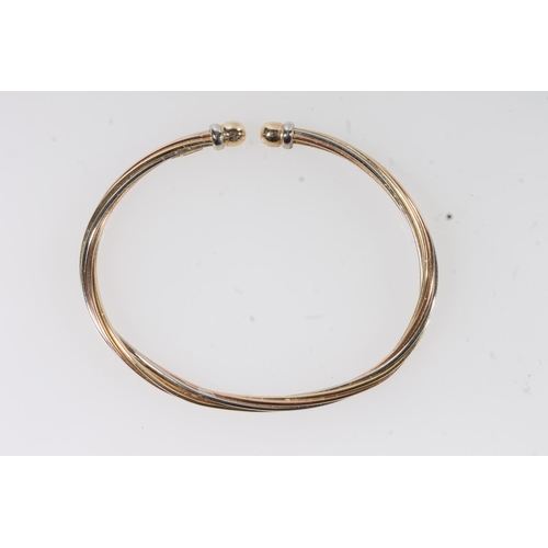 106 - Italian 18ct gold torque bangle, 11.1g.