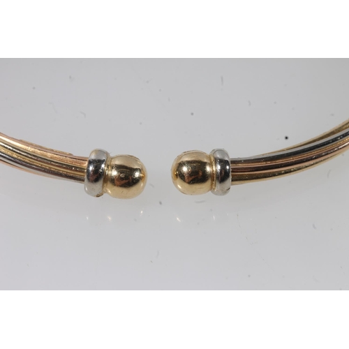 106 - Italian 18ct gold torque bangle, 11.1g.