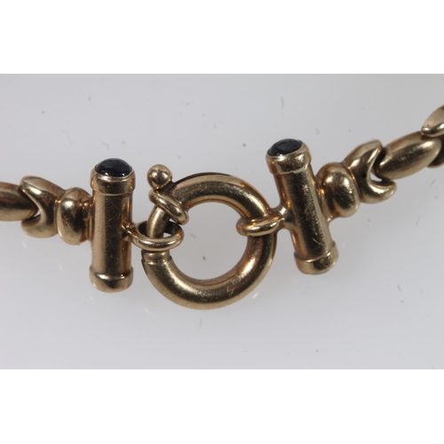 109 - 9ct gold fancy link bracelet with Albert bar terminals, 12.1g.