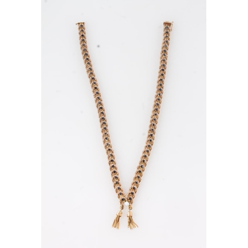 110 - Gold double rope twist necklace set with pearl and sapphires, the clasp stamped '14' and with illegi... 