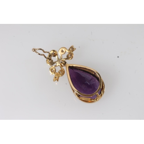 112 - 18ct gold mounted pendant set with faceted tear drop shaped amethyst surmounted by a bow set with sm... 