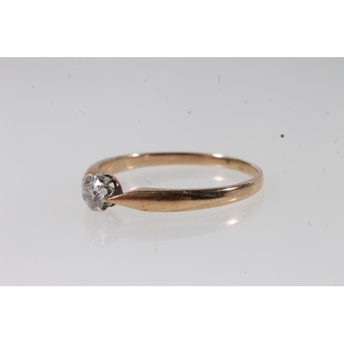 117 - Unmarked diamond solitaire engagment ring, the central diamond approximately 0.25ct,size T, 2.0g.