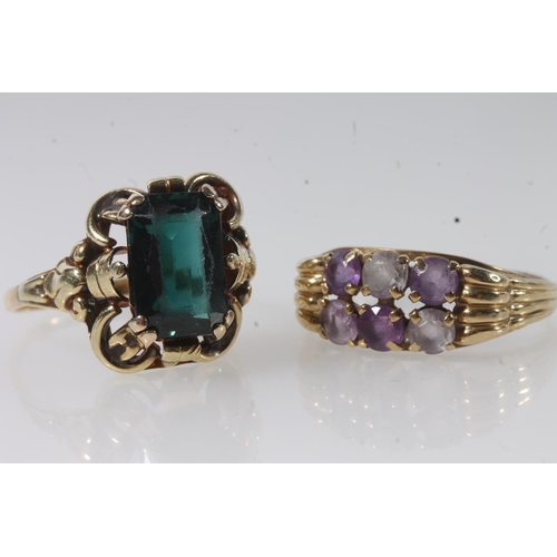 118 - 14ct gold dress ring with large faceted deep green stone, the shank stamped '585', size S, 5.0g and ... 