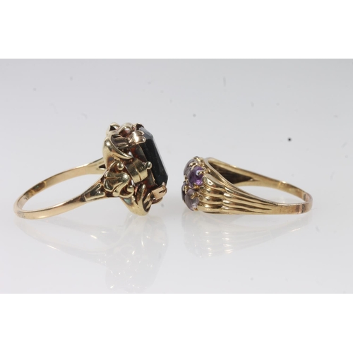 118 - 14ct gold dress ring with large faceted deep green stone, the shank stamped '585', size S, 5.0g and ... 