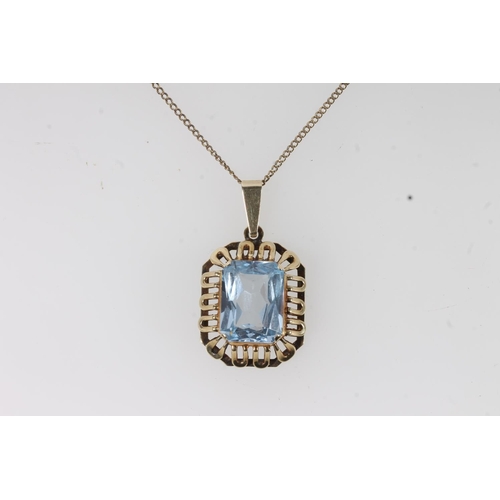 119 - 14ct gold mounted Brutalist style pendant set with faceted aquamarine coloured blue stone, the hoop ... 