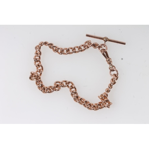 122 - 9ct rose gold curb link watch guard chain with Albert bar, the lobster clasp stamped '9ct', 29g.