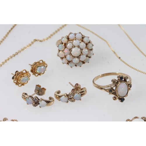 128 - Harlequin suite of opal set gold jewellery to include a 9ct gold bracelet, 10.5g, a 9ct gold cluster... 