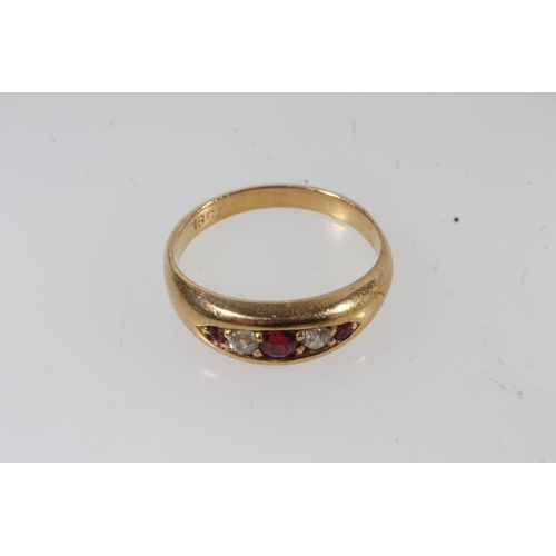 132 - Early 20thC 18ct gold ruby and diamond ring, the graduating stones in a clawed boat setting on a tap... 