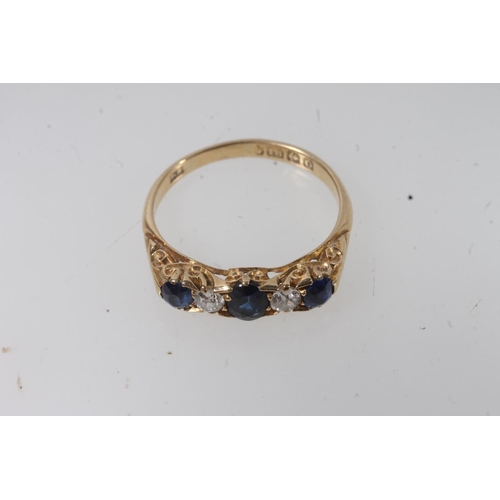 133 - c1930s 18ct gold sapphire and diamond five stone ring, the oval cut sapphires and round cut diamonds... 