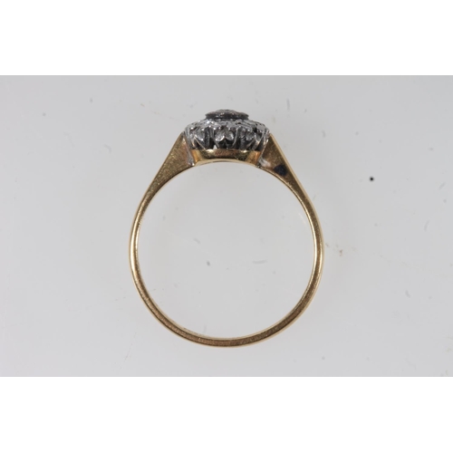 135 - 18ct gold diamond cluster ring, the principal round cut diamond bezel set within a halo of prong set... 