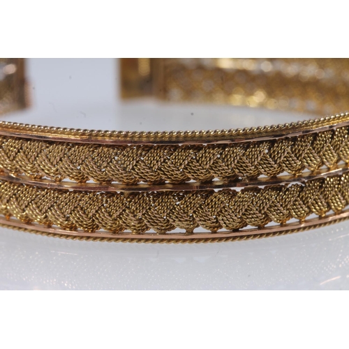 160 - Indian fine meshwork filigree yellow metal bangle.