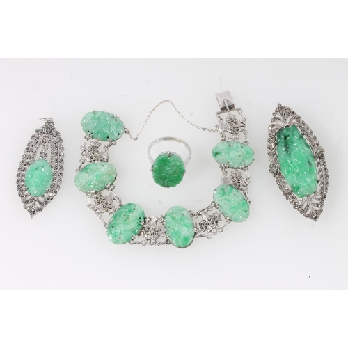 174 - Chinese jade and white metal jewellery, the spinach green jade plaques finely carved and set in whit... 