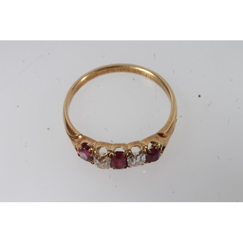 176 - 18ct gold ruby and diamond ring, the three oval cut diamonds separated by round cut diamonds, on scr... 