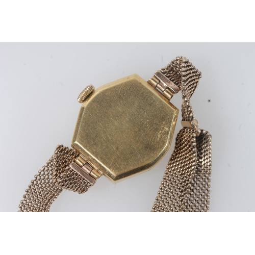 188 - 18ct gold cased Movado ladies cocktail watch, the hexagonal case with silvered dial, baton five minu... 