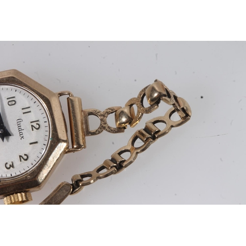 192 - Ladies 9ct gold Gudax wristwatch, the dial with arabic numerals and subsidiary seconds dial, on 9ct ... 