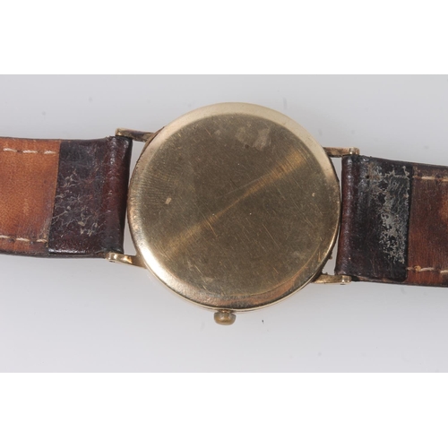 194 - Gents 9ct gold Geneve wristwatch, the champagne tone dial with gilt hour markers, date aperture set ... 