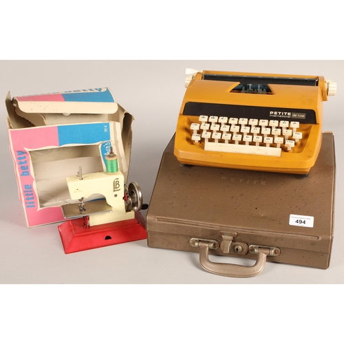 494 - Little Betty children's sewing machine with a Petite International Deluxe typewriter in carry case