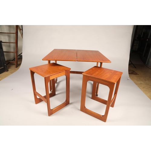 556 - Mid century nest of three tables on casters