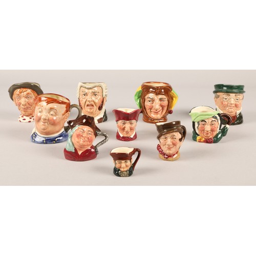 334 - Ten miniature toby jugs