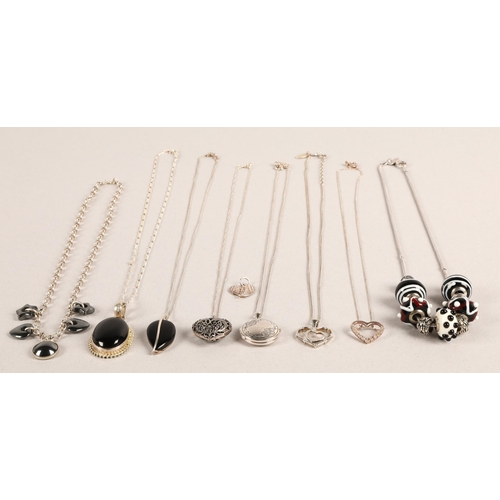 115A - Contemporary silver and white metal necklaces and pendants to include locket, gem set hearts, black ... 