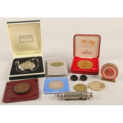 46 - Commemorative coins, Dalvey Scotland boxed pocket watch, Appella desk clock, The Metropolitan whistl...