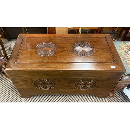 568 - Oriental mahogany coffer with carved detail