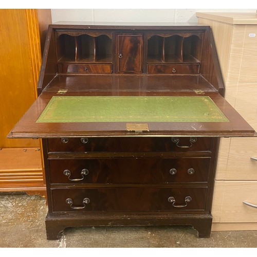 668 - Mahogany four drawer bureau