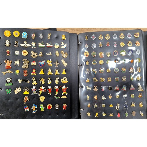 347 - Two folders of vintage pin badges to include extensive collection of police force, Metropolitan poli... 