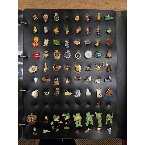 347 - Two folders of vintage pin badges to include extensive collection of police force, Metropolitan poli... 