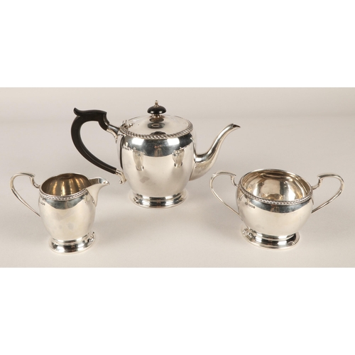 179 - Three piece silver tea set, Sheffield 1931, approx. 1007g gross weight