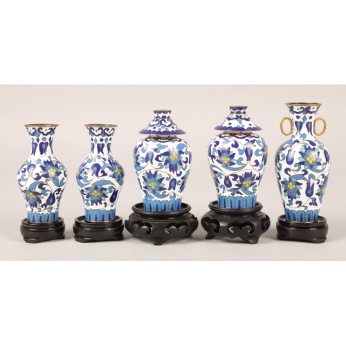 197 - Assortment of miniature cloisonne vases and metal enamel finger bowls, with a selection of wooden st... 