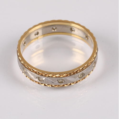 124 - 18ct gold two tone band set with white stones, 3.8g, ring size P