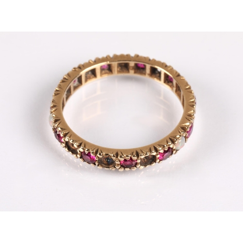 140 - 9ct gold eternity band set with pink and opal stones (some missing), 2g, ring size M