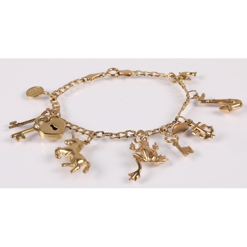 90 - 9ct gold charm braclet with charms including horse, frog, key, St Christopher, saxophone etc. 8.4g g... 