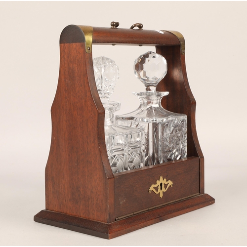 545 - Tantalus with two cut glass decanters