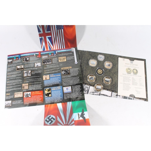 1629 - The London Mint Office The Road To Victory 1939-1945 coin set which includes a GIBRALTAR gold double... 