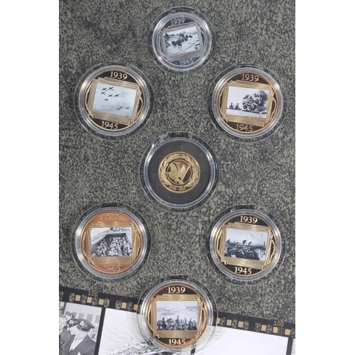 1629 - The London Mint Office The Road To Victory 1939-1945 coin set which includes a GIBRALTAR gold double... 