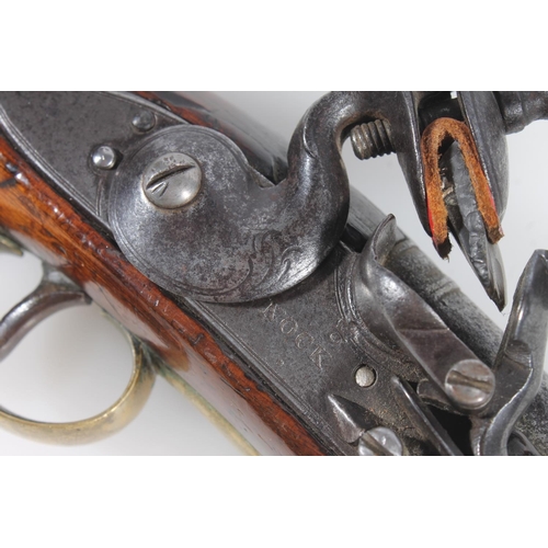 1834 - Antique flintlock pistol by Nock having 23cm long unsighted tapering circular section barrel, mahoga... 