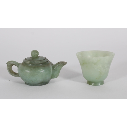 353 - Chinese celadon jade miniature teapot, a white jade cup and other smaller jade drinking vessels, max... 