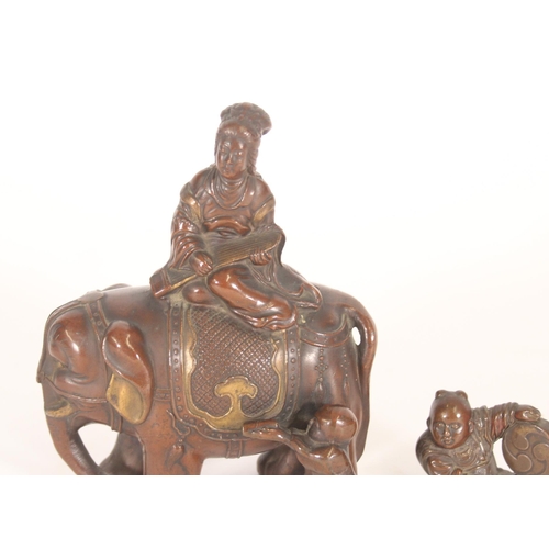 367 - Japanese bronzed metal figure of a musician atop an elephant, together with a small Japanese bronze ... 