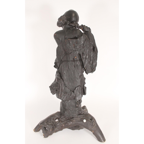 370 - Large Chinese lacquered root wood figure of Damo, the ascetic monk shouldering a club with bowl in h... 