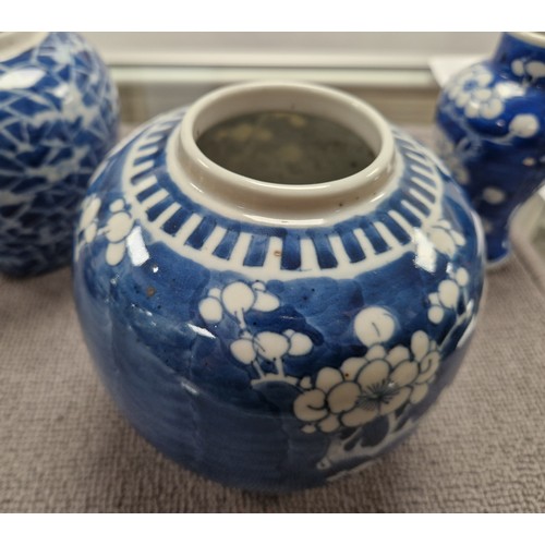 170 - Three Oriental blue and white vases, the largest jar measures 13cm h