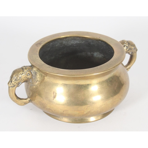 372 - Chinese bronze censer, the flared rim leading to squat body with cast elephant head handles, with ap... 