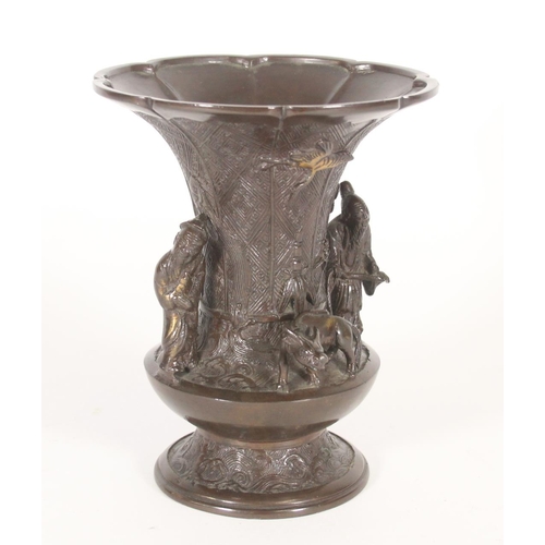 375 - Chinese patinated bronze vase, with flared lotus shape rim over a fretwork engraved body with applie... 