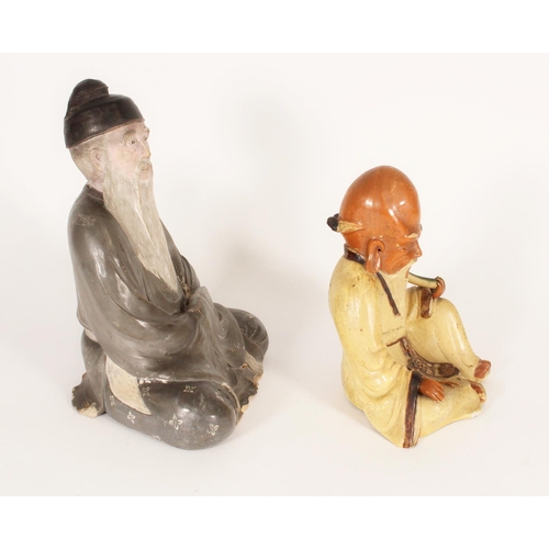 379 - Chinese painted pottery figure of Shou Lao holding a sceptre, together with another painted Chinese ... 