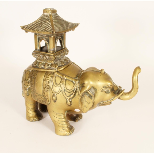 384 - Chinese brass elephant censer, the cast elephant carrying windowed pagoda, H29.5cm.