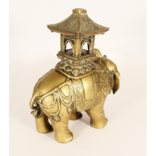 384 - Chinese brass elephant censer, the cast elephant carrying windowed pagoda, H29.5cm.