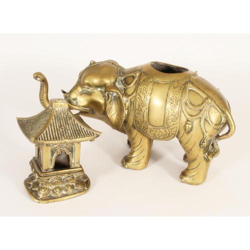 384 - Chinese brass elephant censer, the cast elephant carrying windowed pagoda, H29.5cm.